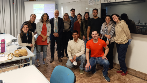Professor Alessandro Maria Michetti with students from the postdoctoral course