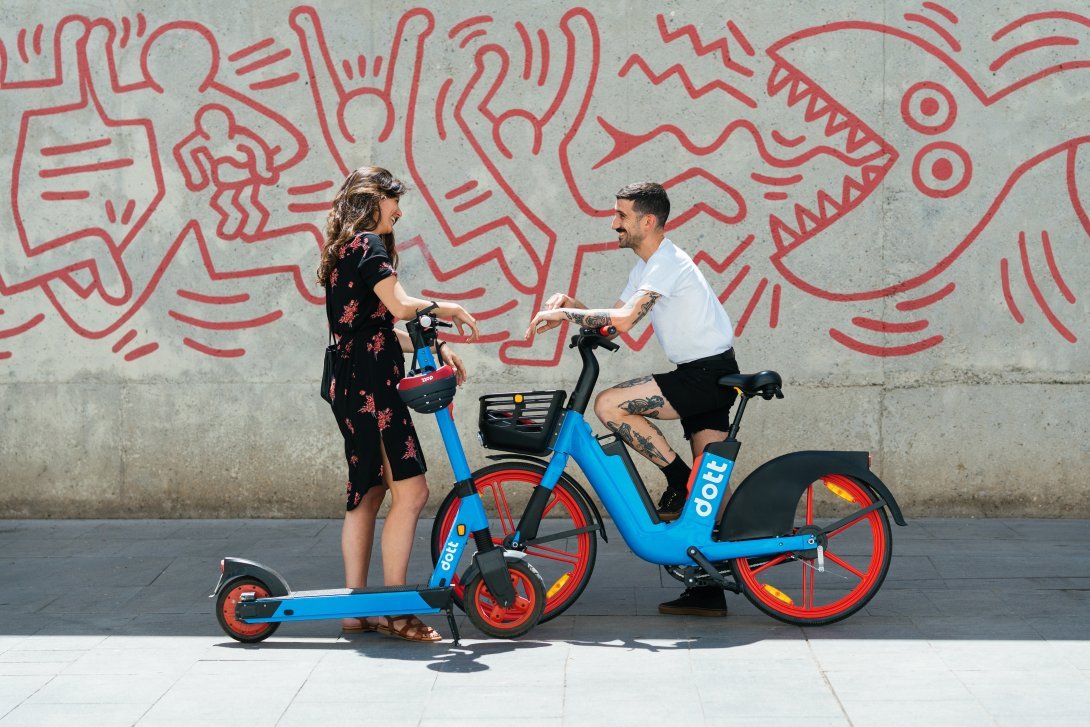 Two teenagers on a rentbike